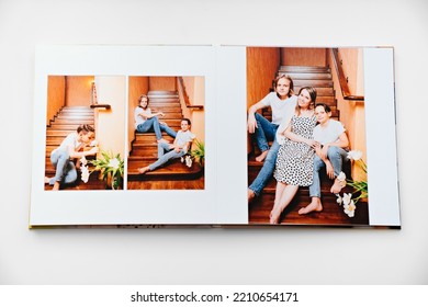 Pages Of A Photobook From A Photo Shoot Of A Large Family. Preservation Of Memory Of Important Moments Of Life. Professional Photographer And Printing House.