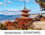 Pagoda of Kiyomizu-dera buddhist temple in autumn, Kyoto, Japan