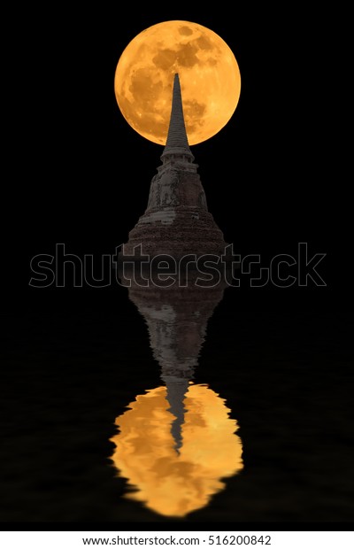 Pagoda\
and super moon yellow and shadows in the\
water.