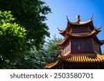 Pagoda and tree with blue sky at Chinese Garden, Sydney