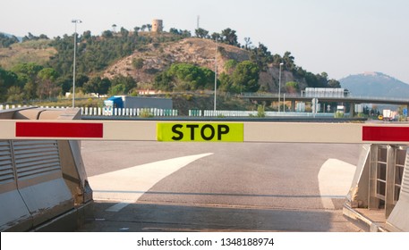 Paid Highways In India. Terminal Fare, Toll Road. Barrier With A Stopping Sign: Stop!