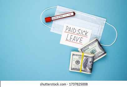 Paid Sick Leave With A Medical Mask And Money On A Blue Background. Dollars In A Pack And A Positive Test For Covid-19