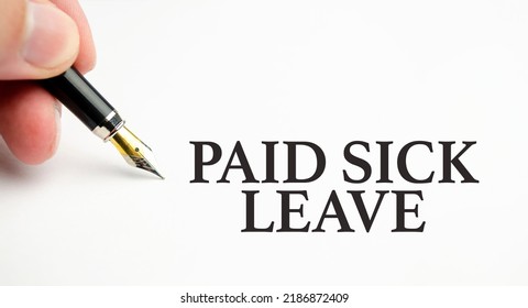 Paid Sick Leave Words And Pen On White Background