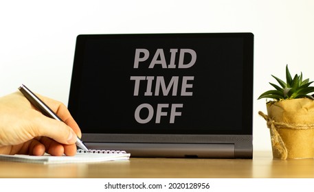 Paid Time Off Symbol. Tablet With Words 'Paid Time Off'. Businessman Hand With Pen, House Plant. Beautiful White Background. Business, Paid Time Off Concept, Copy Space.