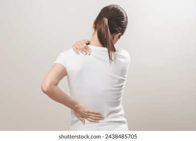 Pain body muscles stiff problem, asian young woman, girl painful with back, neck ache from work hand holding massaging rubbing shoulder hurt, sore on white background. Health care and medicine concept - Powered by Shutterstock