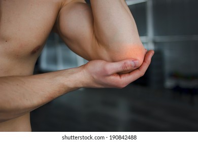 Pain in elbow.Sport injury or another pain concept