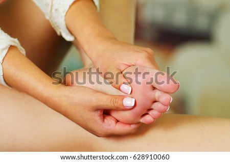 Pain in the foot, auto massage of female feet.