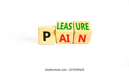 Pain Or Pleasure Symbol. Concept Words Pain Or Pleasure On Wooden Cubes. Beautiful White Table White Background. Business And Pain Or Pleasure Concept. Copy Space.