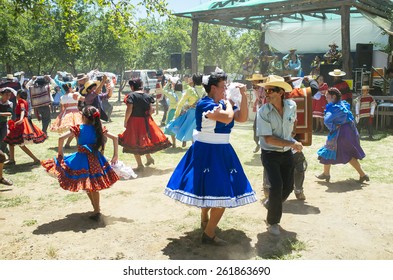 Paine, Chile. Nov 11, 2014. Unidentified folkloric "cueca" dancers during traditional festival in the Chilean countryside.