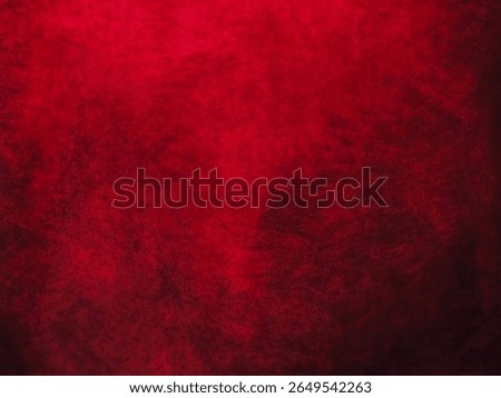 Pained cloth or canvas background. Surface of a textile with random shape and color. Design background. Red color.