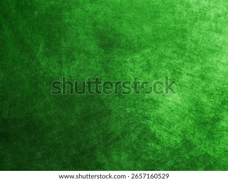 Pained cloth or canvas background. Surface of a textile with random shape and color. Design background. Irish green and black background.