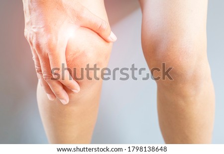 Painful posture of a person's muscles and knee joints.
