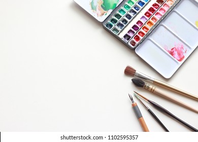 Paint accessories and watercolor Isolated On White (workplace mock up,Copy Space,Isolated, White Copy space,Color Copy space, Blank Copy Space, On White.)