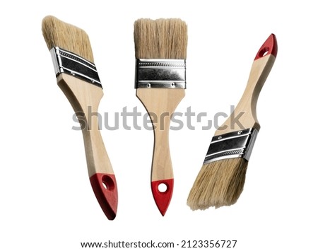 Paint brush in different angles on a white background