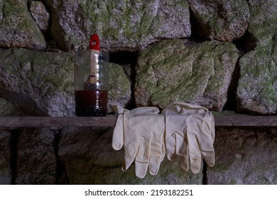 Paint brush in jar with solvent and gloves on wood plank and stone background with copy space. Restoration and DIY concept - Powered by Shutterstock