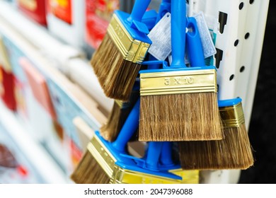 Paint Brushes In The Assortment Of The Hardware Store. Tools For Interior And Exterior Decoration Of Premises. Foreground