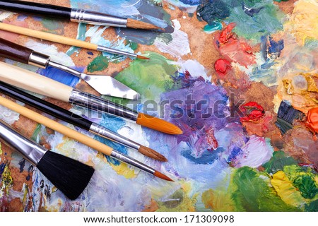 paint brushes on a palette 