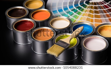 Paint can and paintbrush