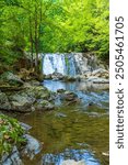 Paint Creek spawns Kelley Falls and continues to flow downs a rocky streambed in the mountains of northeast Tennessee.