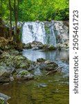 Paint Creek spawns Kelley Falls and continues to flow downs a rocky streambed in the mountains of northeast Tennessee.