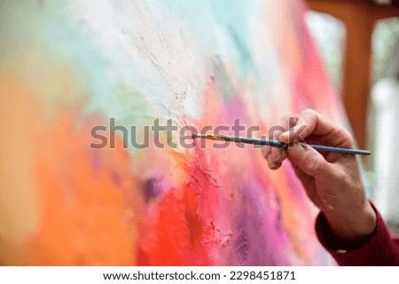  Paint mixing, painting, brush painting,artist painter at work