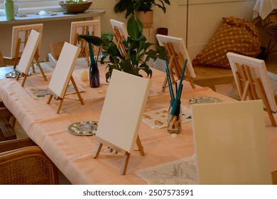 Paint n Sip table setup for women’s surf retreat - Powered by Shutterstock