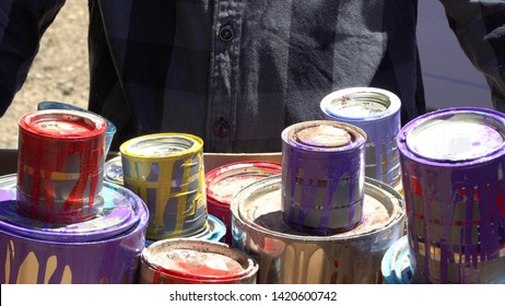 Paint recycling company accepts empty oil-based paint cans for recycling. Hazardous waste disposal service - Shutterstock ID 1420600742