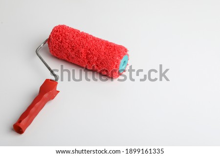 Paint roller brush isolated on white background