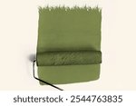 Paint roller creating a green grass effect on a white wall. Green paint mimics grass. Roller painting grass-like texture. Green grass paint effect on white wall background.