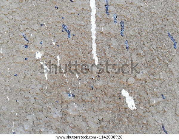 Paint running on the plaster. Stone wall.\
Texture. Background.