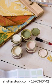 Paint Tester Pots With Color Swatches And Fabric Samples