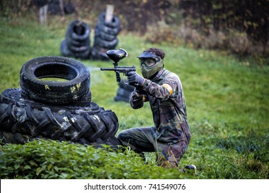 Paintball player aiming