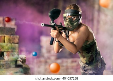 
Paintball Player Shootout From Marker Gun