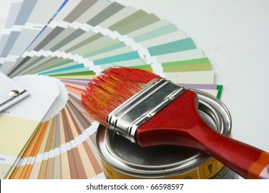 Paintbrush and colorful paint