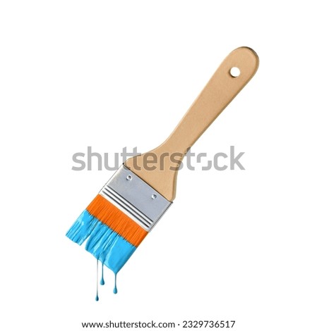 Paintbrush with dripping aqua blue paint isolated over white background