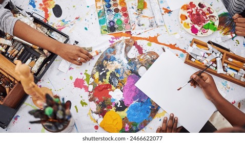 Paintbrush, hands and tools for painting in studio, color and craft in small business and above. Workshop, equipment and supplies in jars or container for project, collaboration and people in store - Powered by Shutterstock