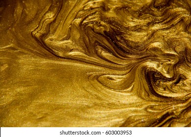 Painted Background. Abstract Emotional Art. Modern Design Element. Golden Liquid Acrylic Paints