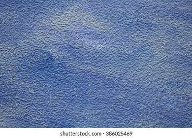 Painted blue and cyan wall texture background