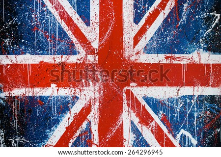 Painted concrete wall with graffiti of British flag. Grunge flag of United Kingdom. Union Jack