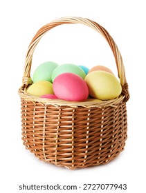 Painted Easter eggs in wicker basket isolated on white
