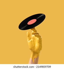 Painted hand touches retro vinyl disc. Contemporary art collage. Modern design work in neoned trendy colors. Tender human hands. Stylish and fashionable composition, youth culture. Monochrome - Shutterstock ID 2149859709