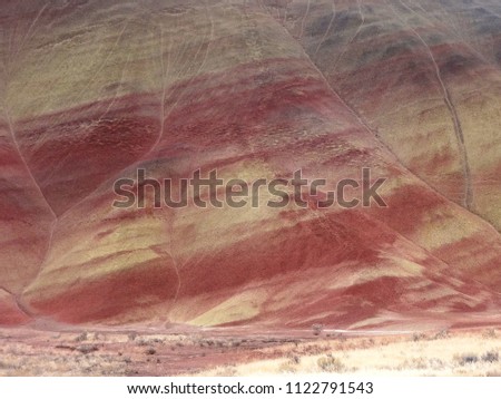 Painted Hills Michell Oregon landscape, located in the John Day Fossil Beds National Monument of central Oregon.
The Painted Hills, colors and banded striations, ancient river floodplain.