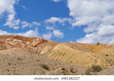 Painted hills on a sunny day. Nature of Mountain Altai.  - Powered by Shutterstock