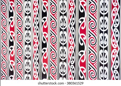 painted Maori decorations on the fence in Rotorua, New Zealand