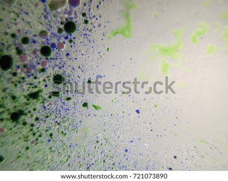 Painted oil drops on the water, backlighting from different directions, large magnification, bokeh, Colored abstractions