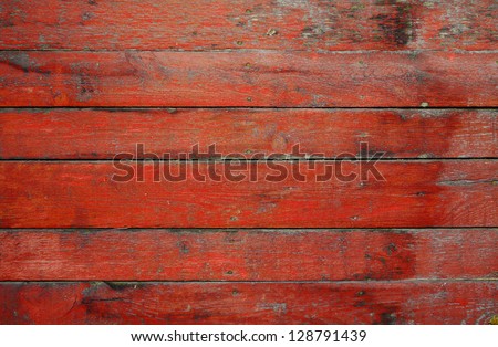 painted old wooden wall. red background