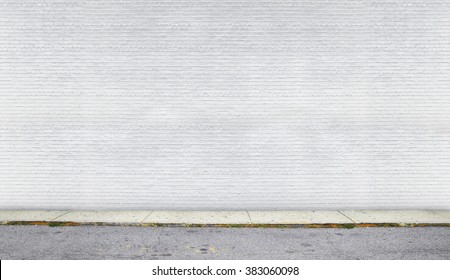 Painted On White And Clear Brick Wall On The Street