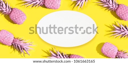 Painted pineapples on a vivid yellow background