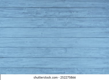 Painted Plain Baby Blue and Gray Rustic Wood Board Background that can be either horizontal or vertical. Blank Room or Space area for copy, text,  your words, above looking down view. Tinted photo.