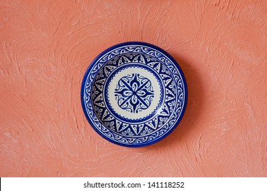 Painted Plate Isolated On Wall